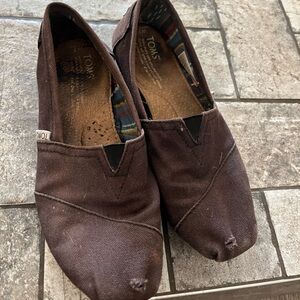 Ladies black Tom’s size 7 used but a lot of life left in them!